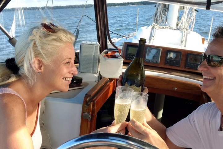 a person drinking water from a boat