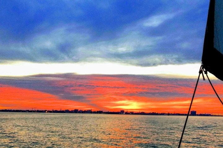 a sunset over a body of water