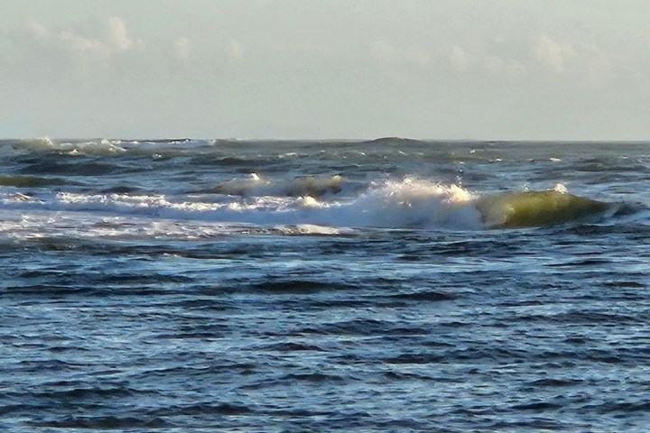 a body of water next to the ocean