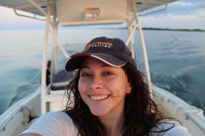 a woman sitting on a boat