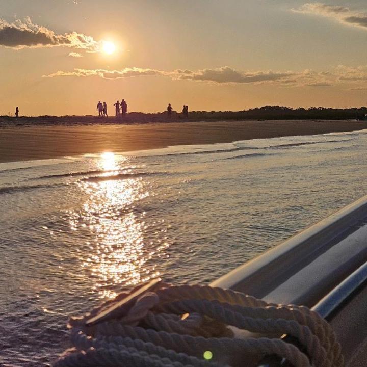 a sunset over a body of water