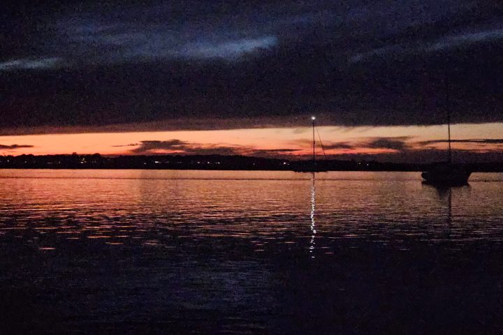 a sunset over a body of water