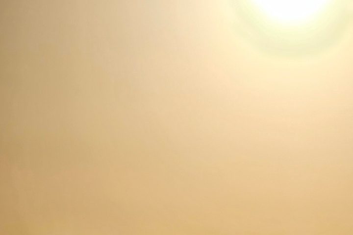 a sunset over a body of water