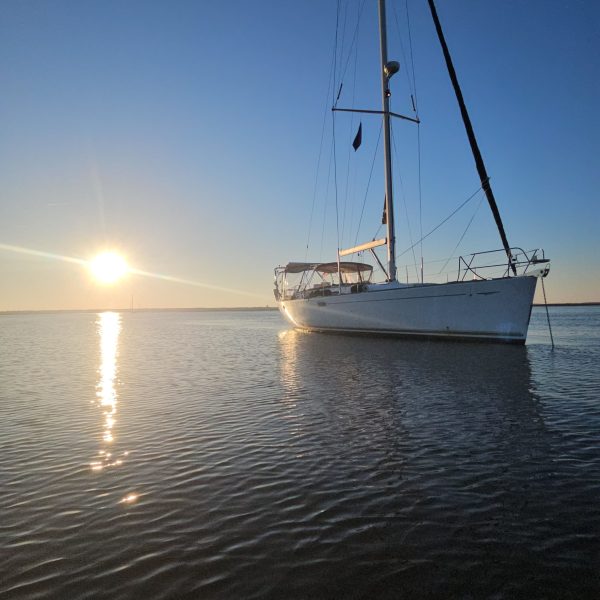 a small boat in a large body of water