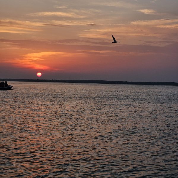 a sunset over a body of water